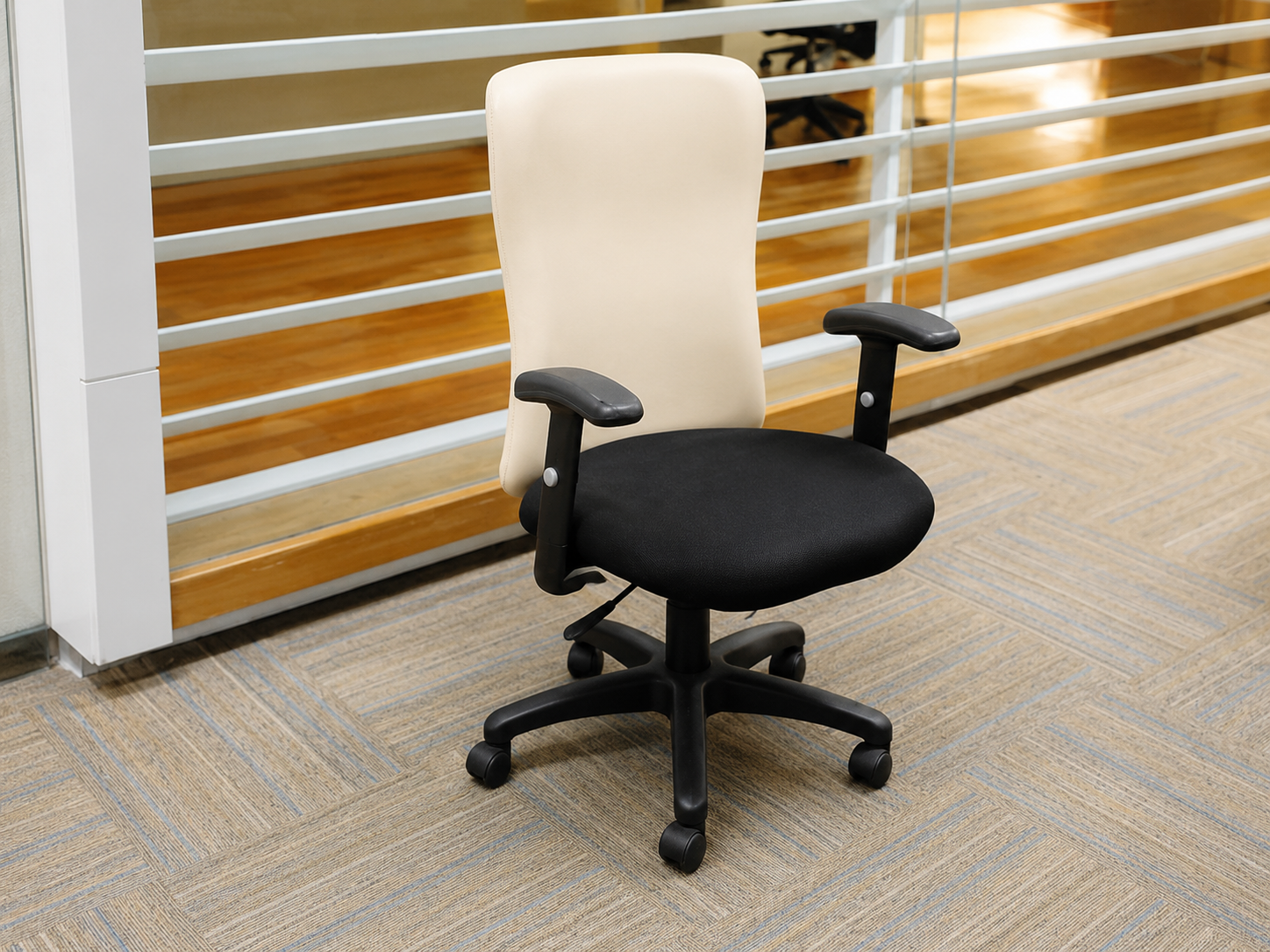 office chair Cream leather backrest, black cloth cushion, with arms.