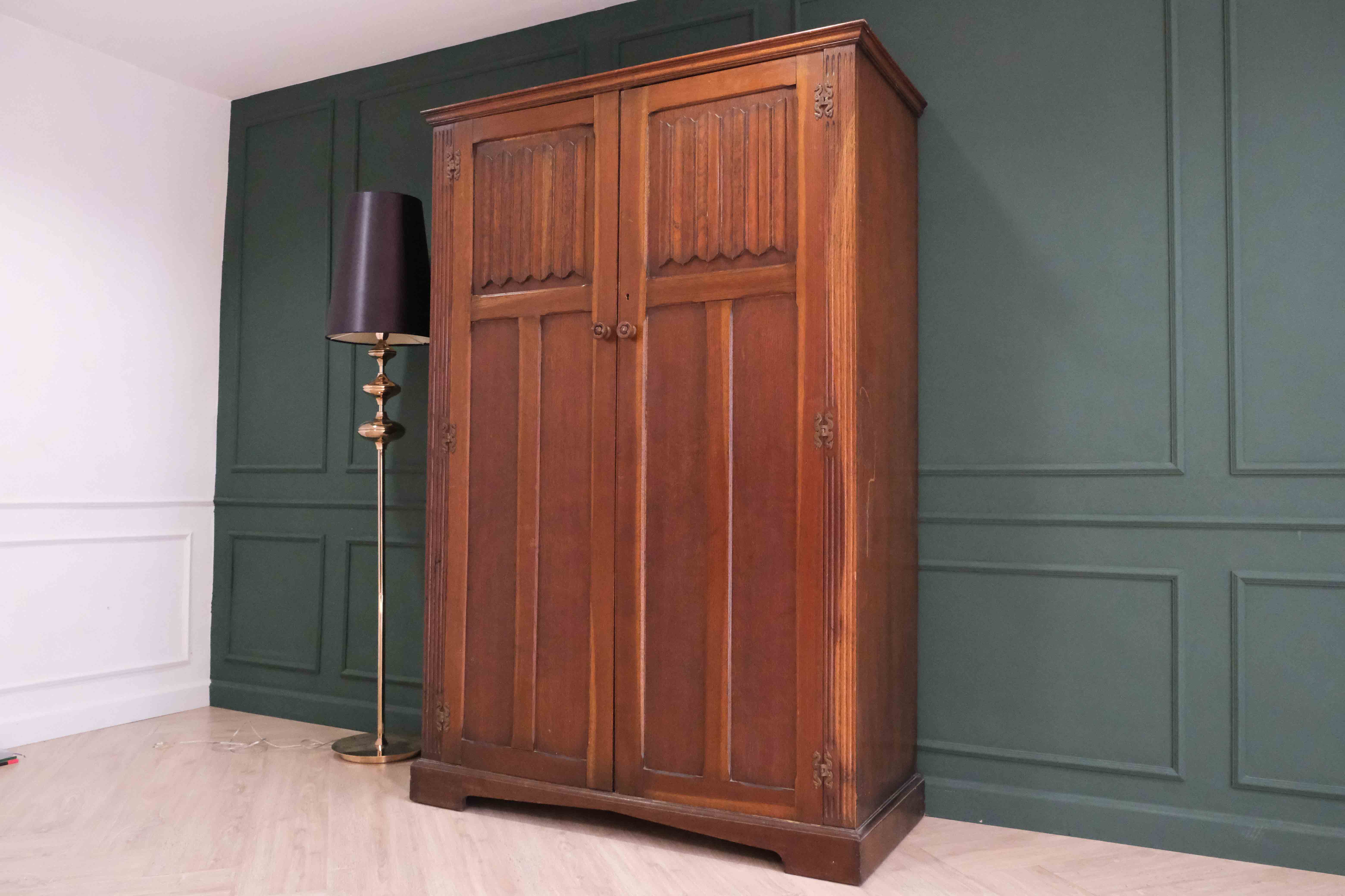 Oak wardrobe with long mirror.