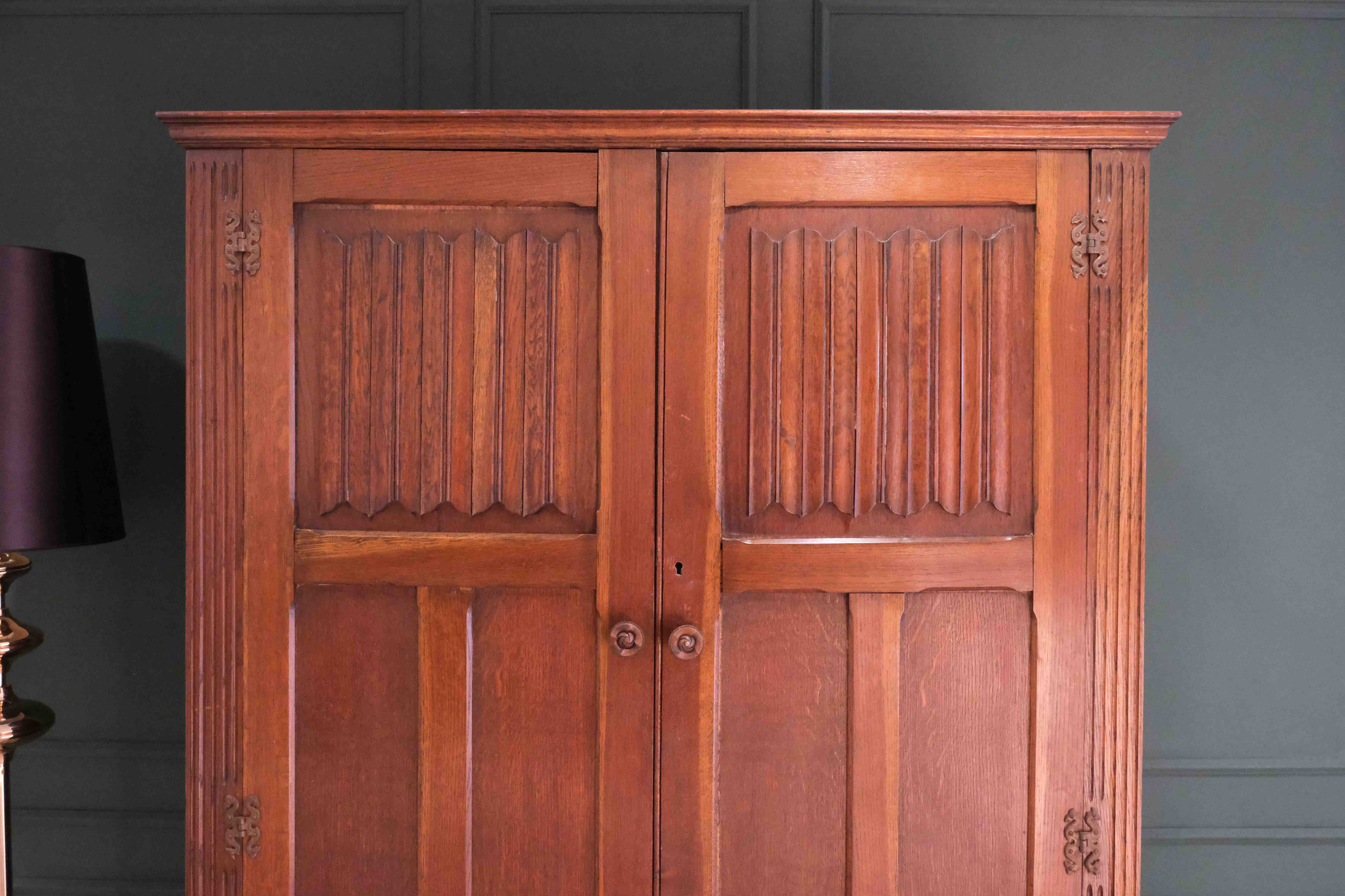 Oak wardrobe with long mirror.