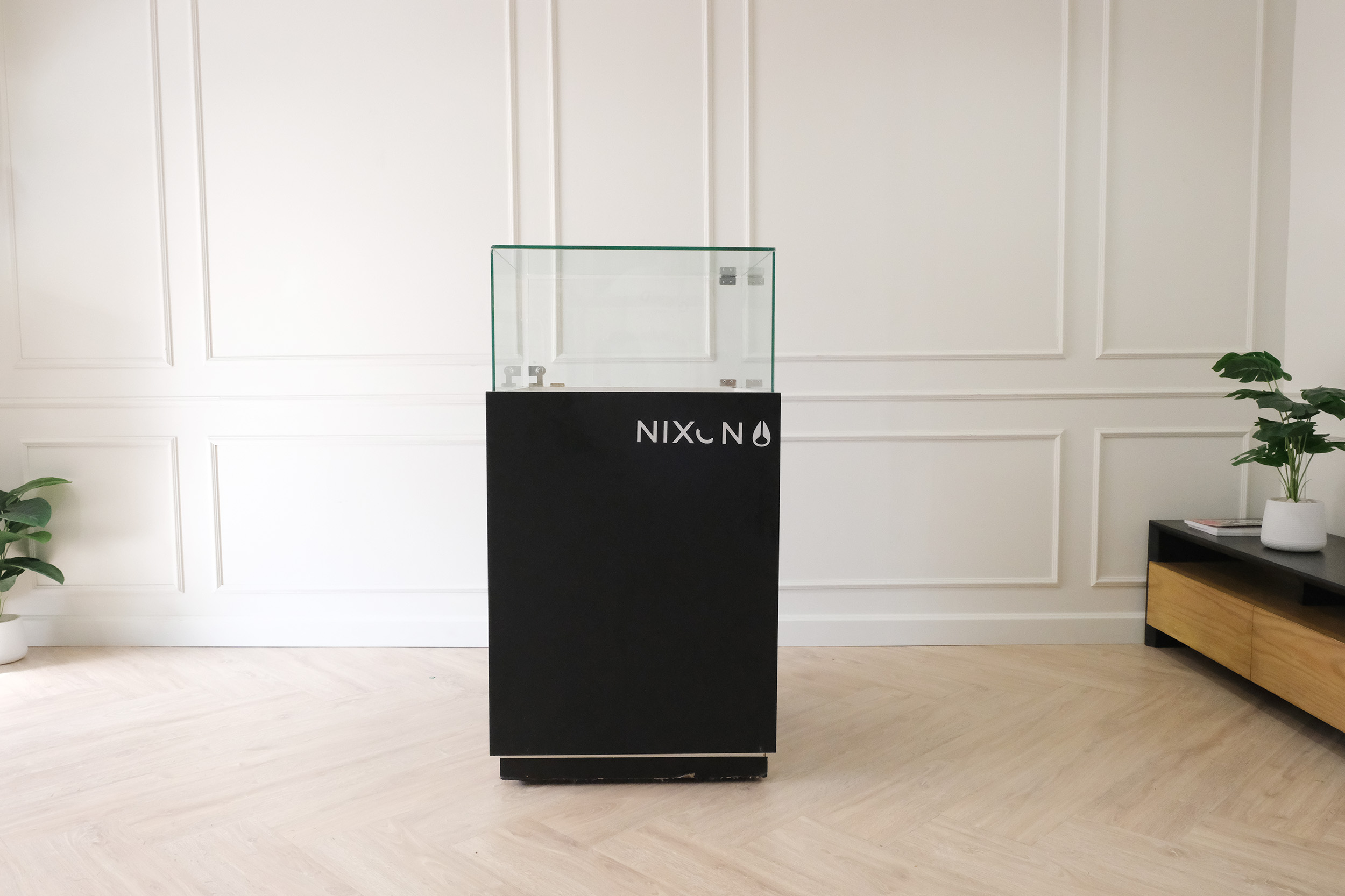 Jewelry cabinet, glass cabinet to display products Square shape, black wooden base, has 2 storage cabinets that open.