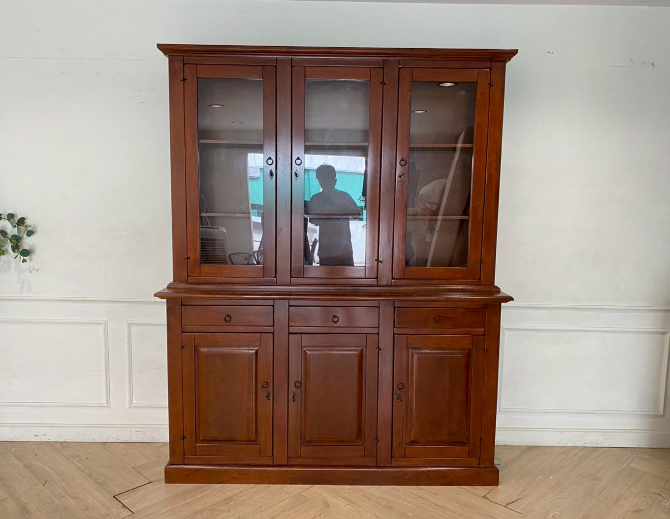 Teak wood display cabinet with 3 glass doors, 3 wooden doors, and 3 drawers.