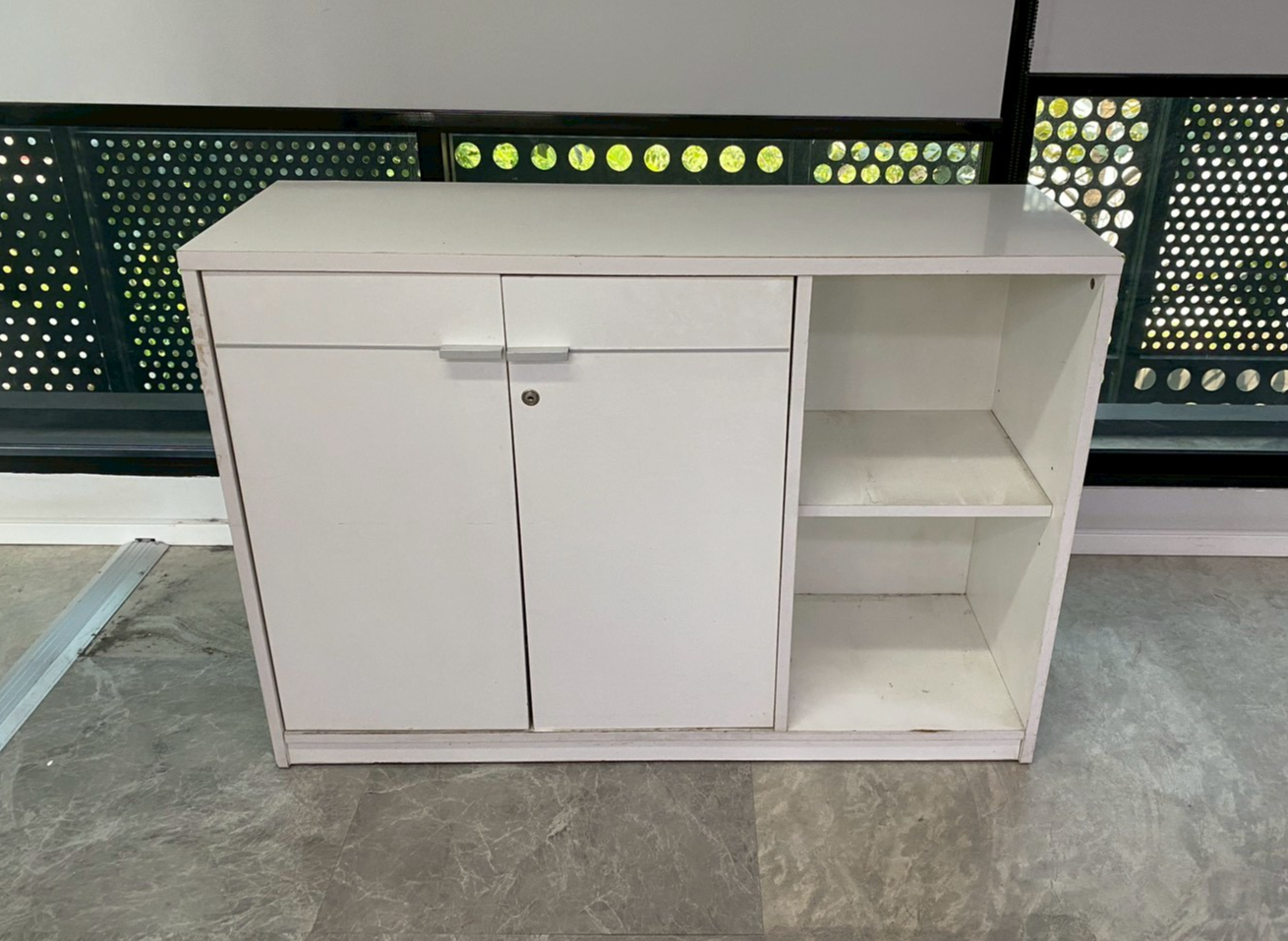 White wooden storage cabinet with two doors and two shelves.