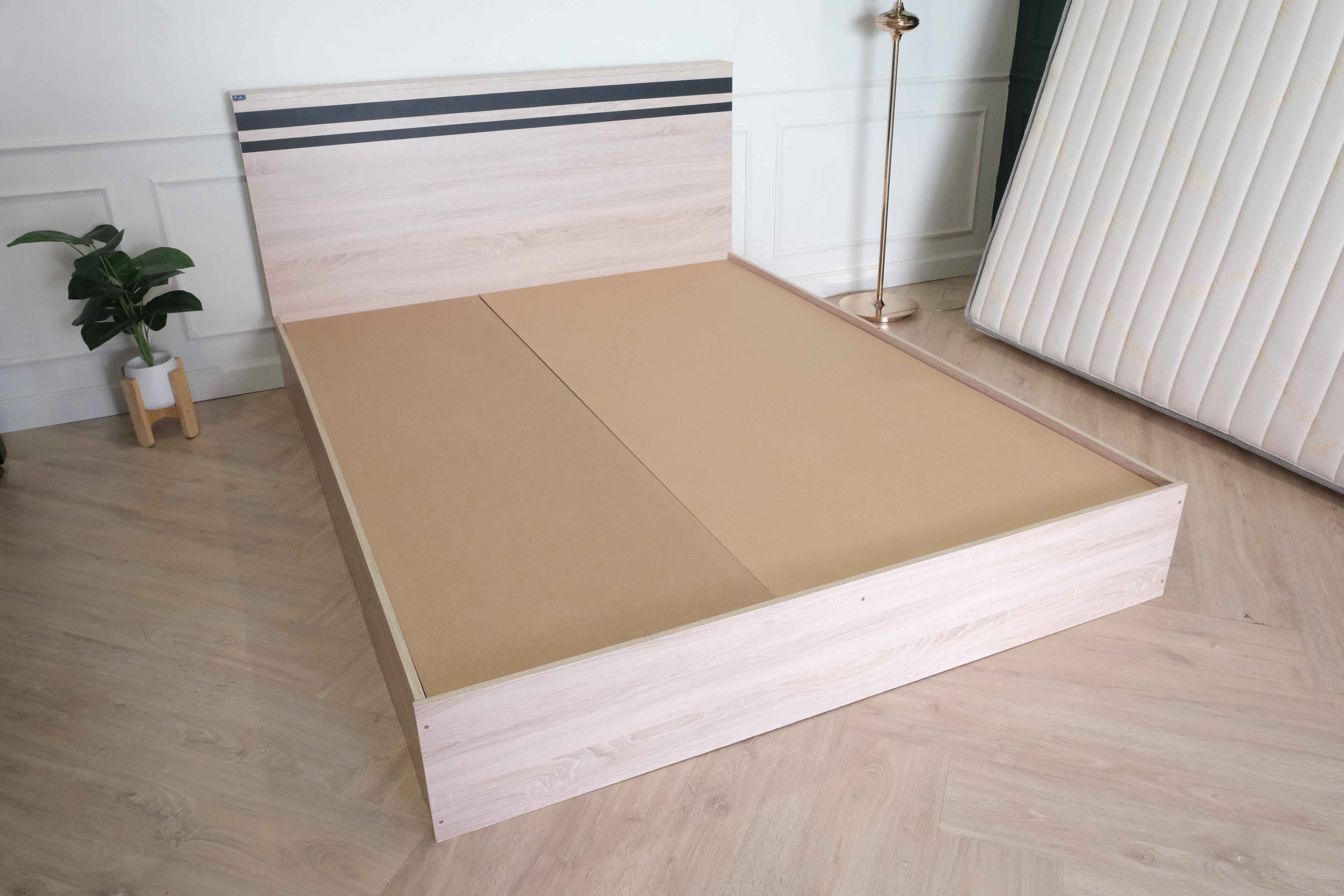 Bed brand T-DA furniture, light colored wooden frame. Black cut lines at the head of the bed, minimalist, 5 feet