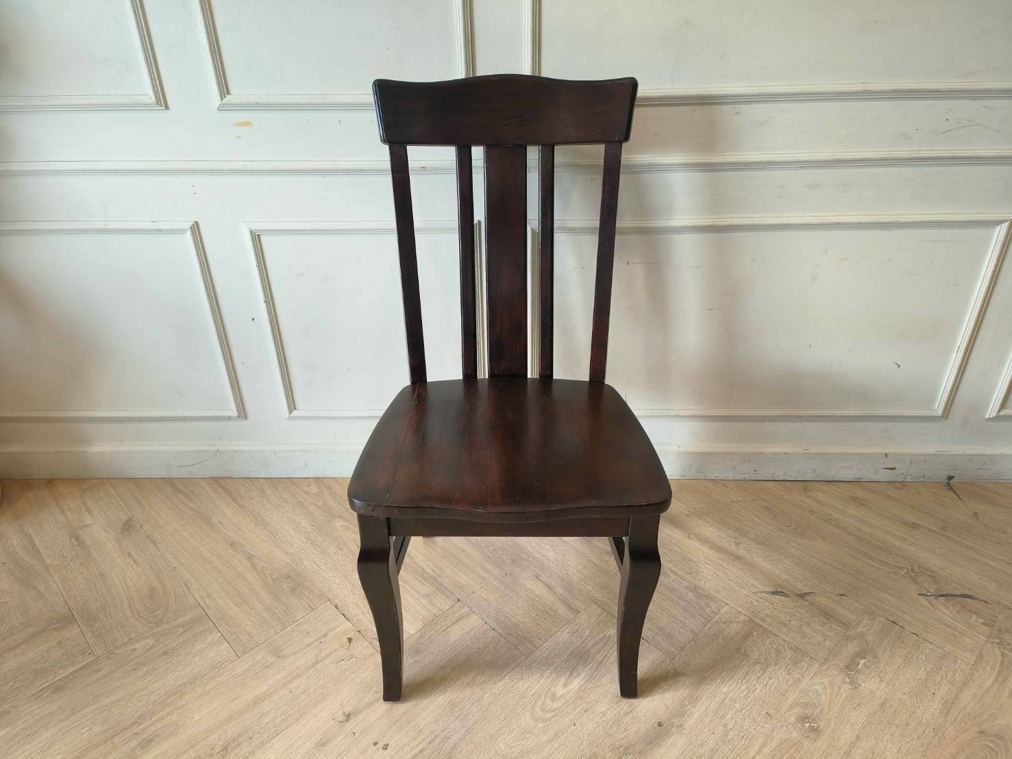 Whole chair made of wood, beautiful frame, dark brown.
