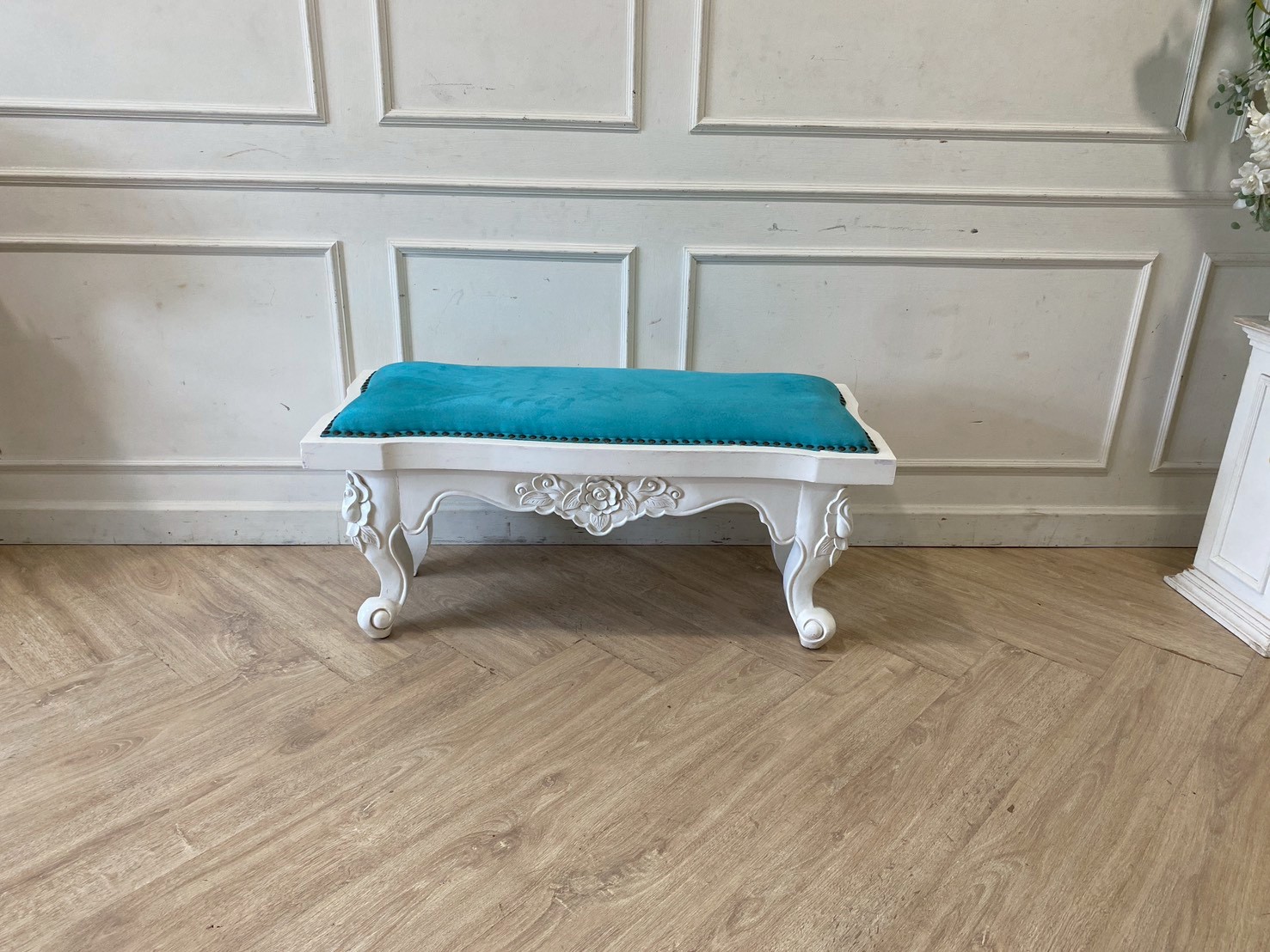 Louis-style wooden stool with blue fabric cushion