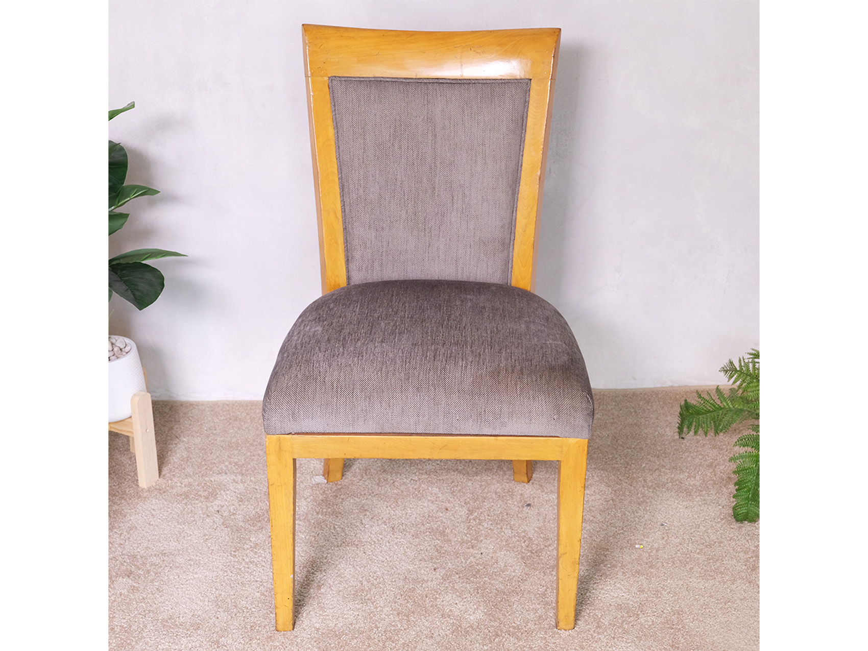 Wooden chair, gray fabric cushion, beautiful brown frame. The backrest has a cushion.