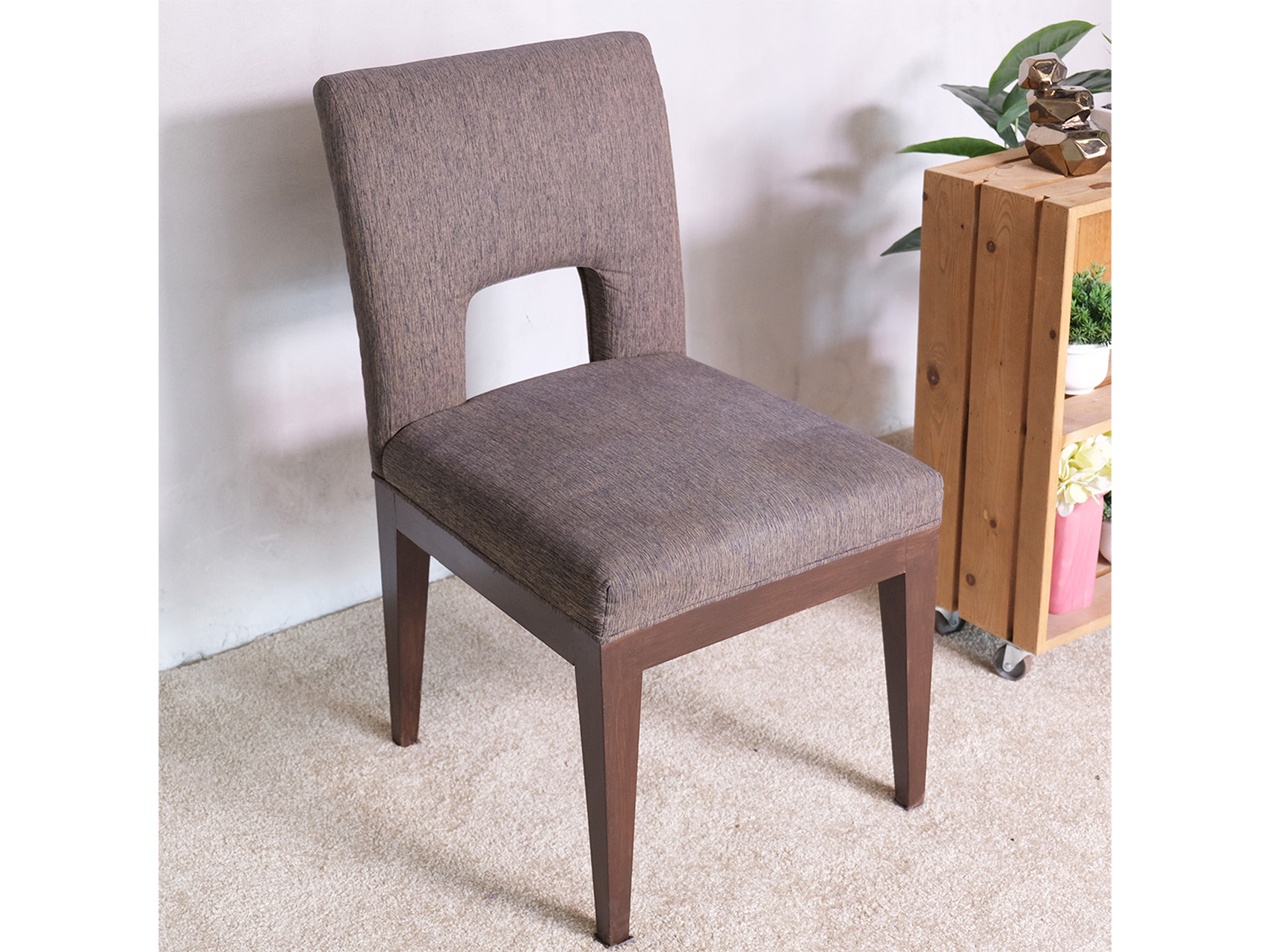 Wooden chair, dark gray fabric cushion, beautiful frame, cushioned backrest.