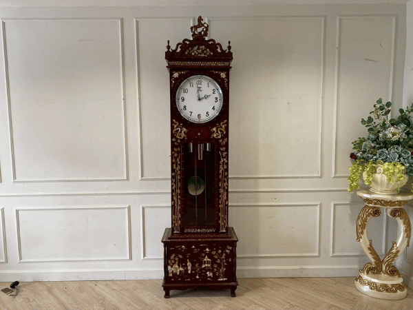 Floor clock decorated with pearls