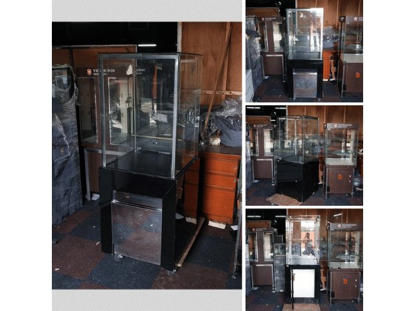 Jewelry cabinet, glass cabinet to display products Tall, square shape glass door open Black wooden base with silver trim