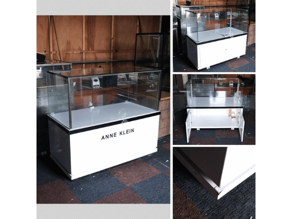 Jewelry cabinet, glass cabinet to display products Rectangular shape glass door open White wooden base with black trim