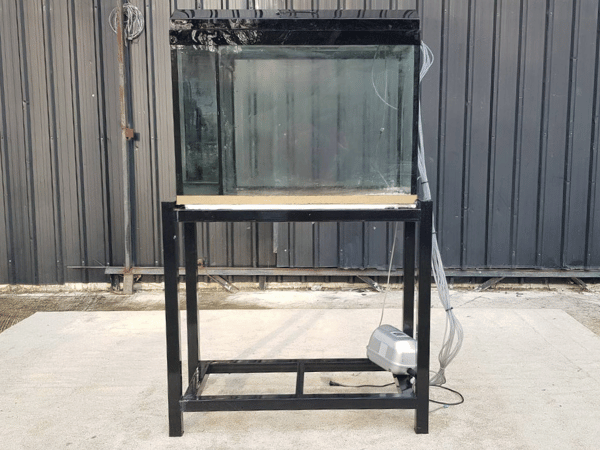 Fish tank with black steel legs